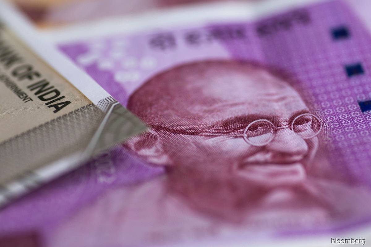 India's record trade deficit in June adds pressure on currency