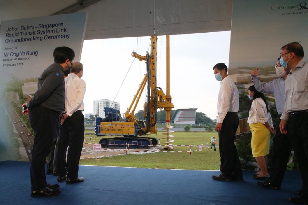Singapore's Minister for Transport Ong Ye Kung watching a rotary drilling rig drill into the ground at the Johor Baru-Singapore RTS Link ground-breaking ceremony yesterday. (Photo by Ooi Boon Keong/TODAY Online)
