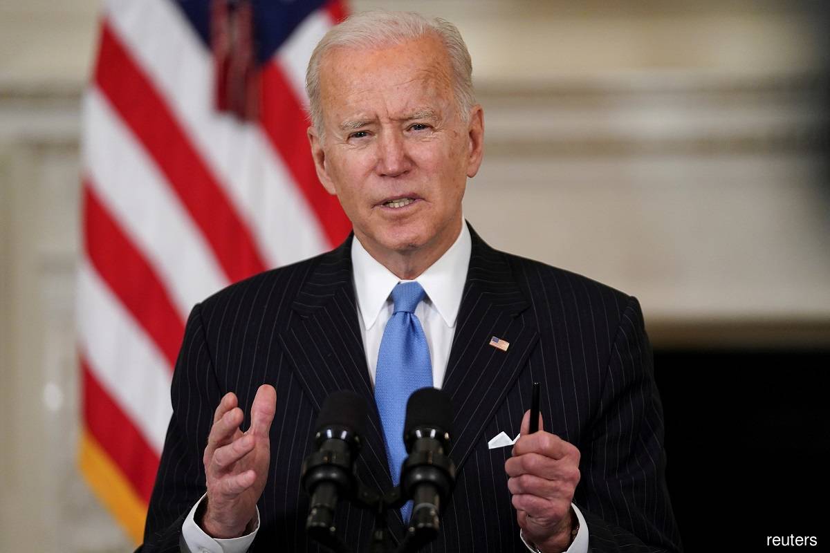 Biden waives solar panel tariffs for four countries, invokes defence law
