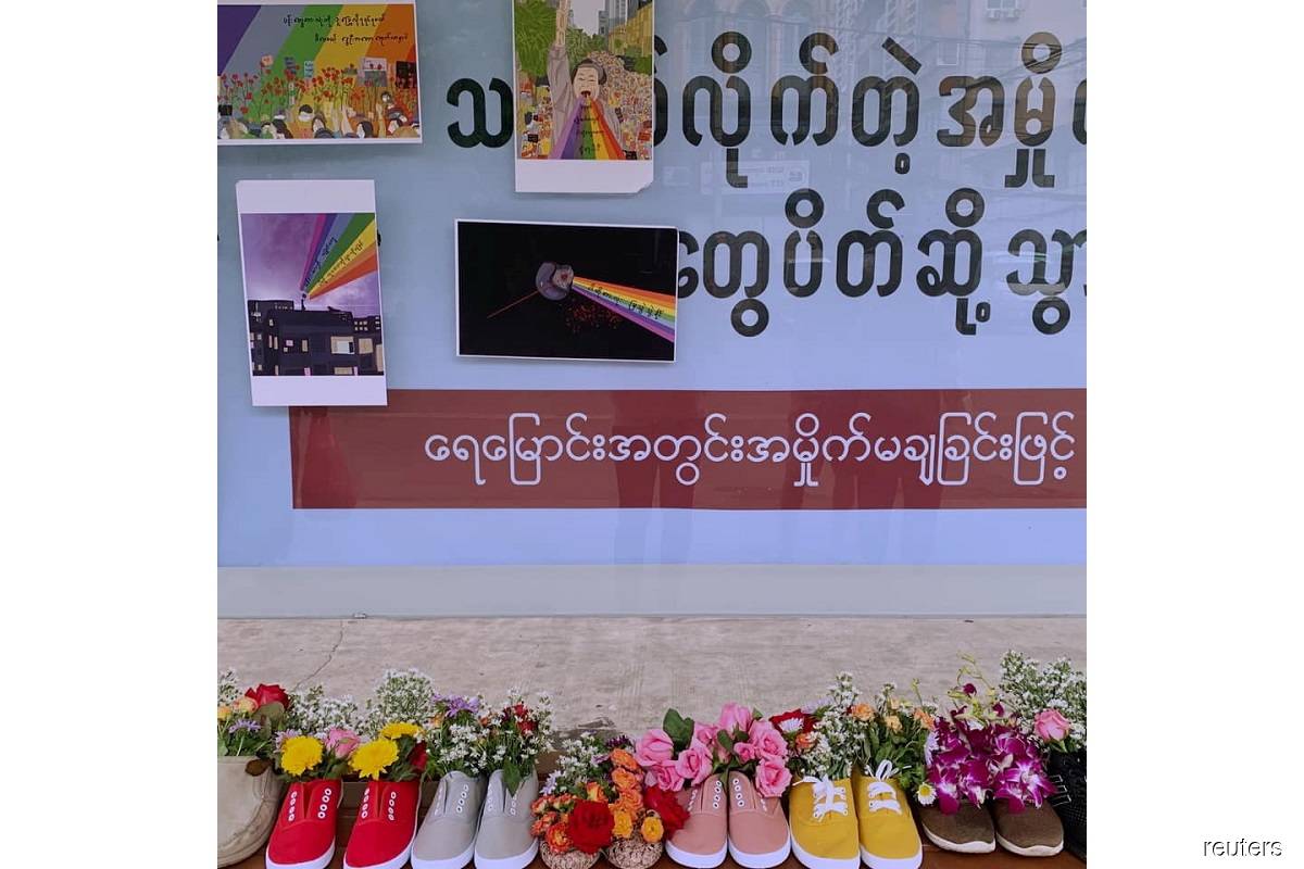 Myanmar activists hold shoe protests; another celebrity detained