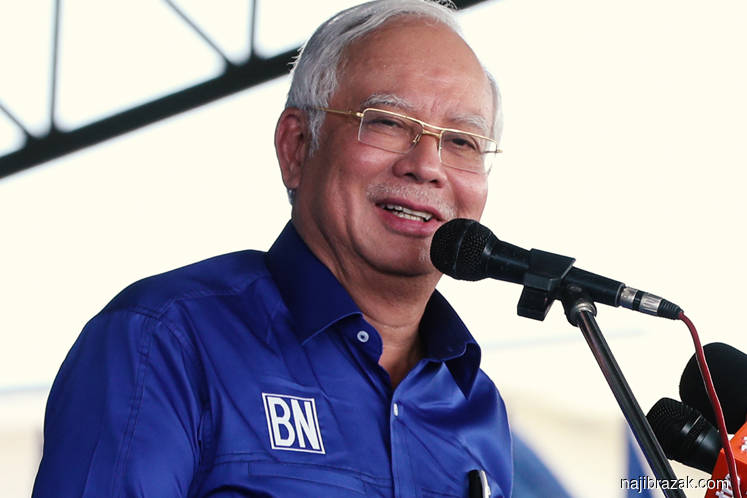 Najib wishes Malaysians happy voting