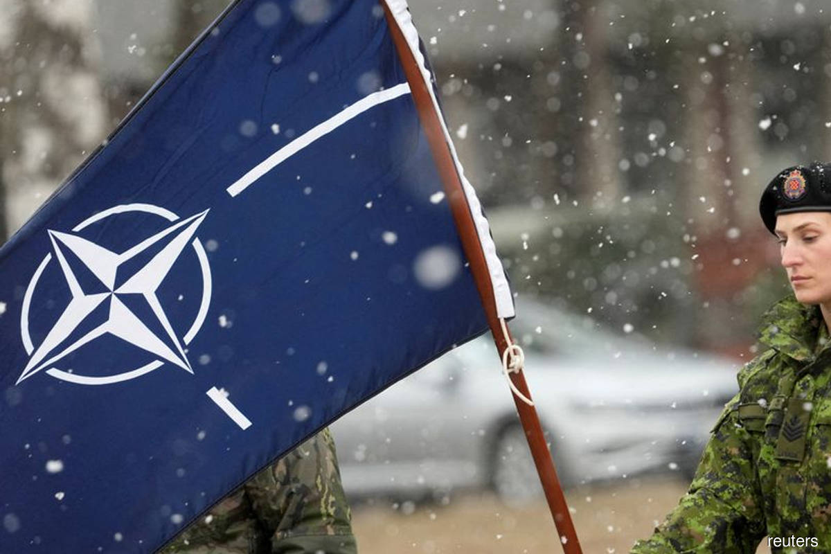 NATO backs military aid for 'heroic' Ukraine, Russia steps up attacks