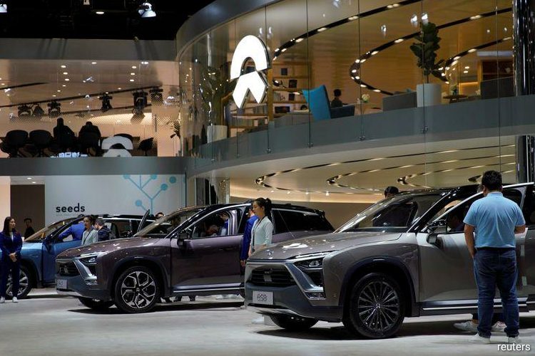 China electric auto champ NIO chases Tesla with $1bn state funding