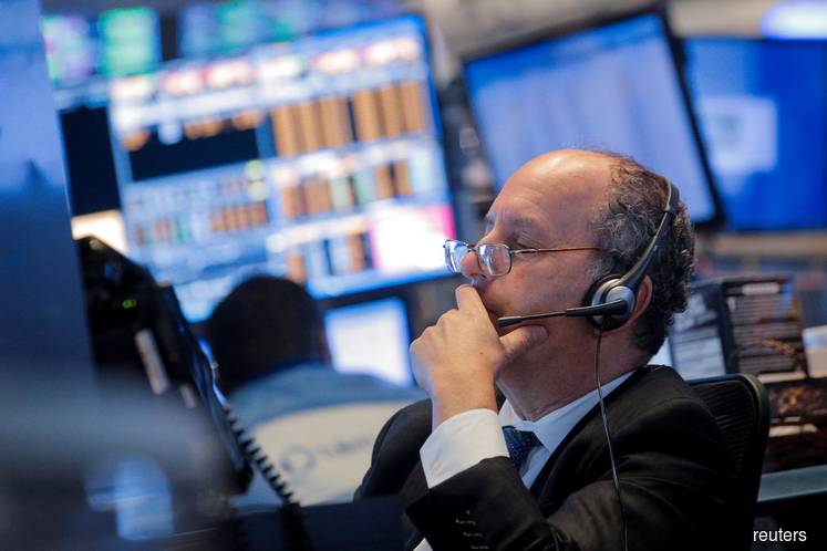 Wall Street ticks higher, but chip stocks tumble