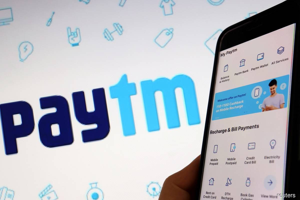 India's Paytm crashes in market debut, business model questioned