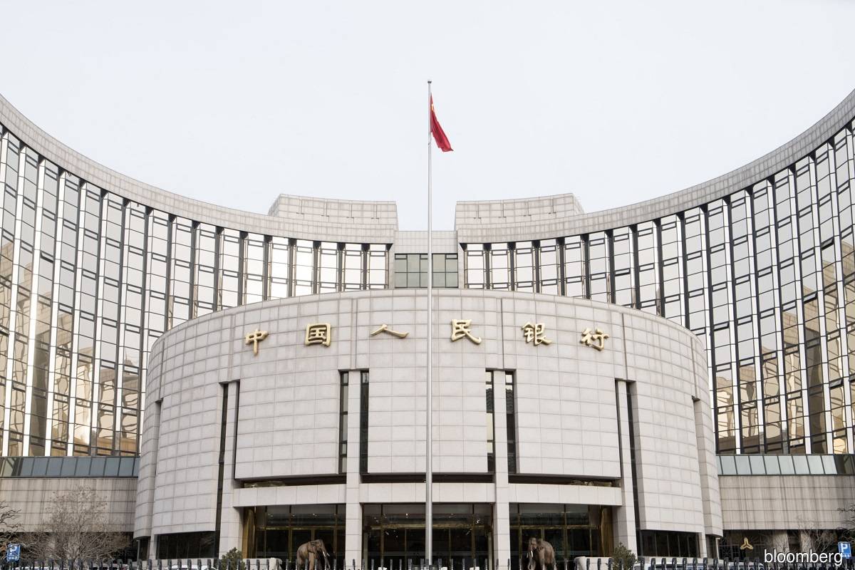 Chinese banks cut borrowing costs as PBOC signals easing