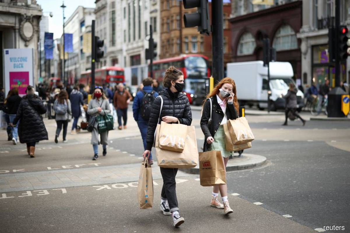 UK’s big reopening marred by Covid-19 chaos and Johnson’s U-turn