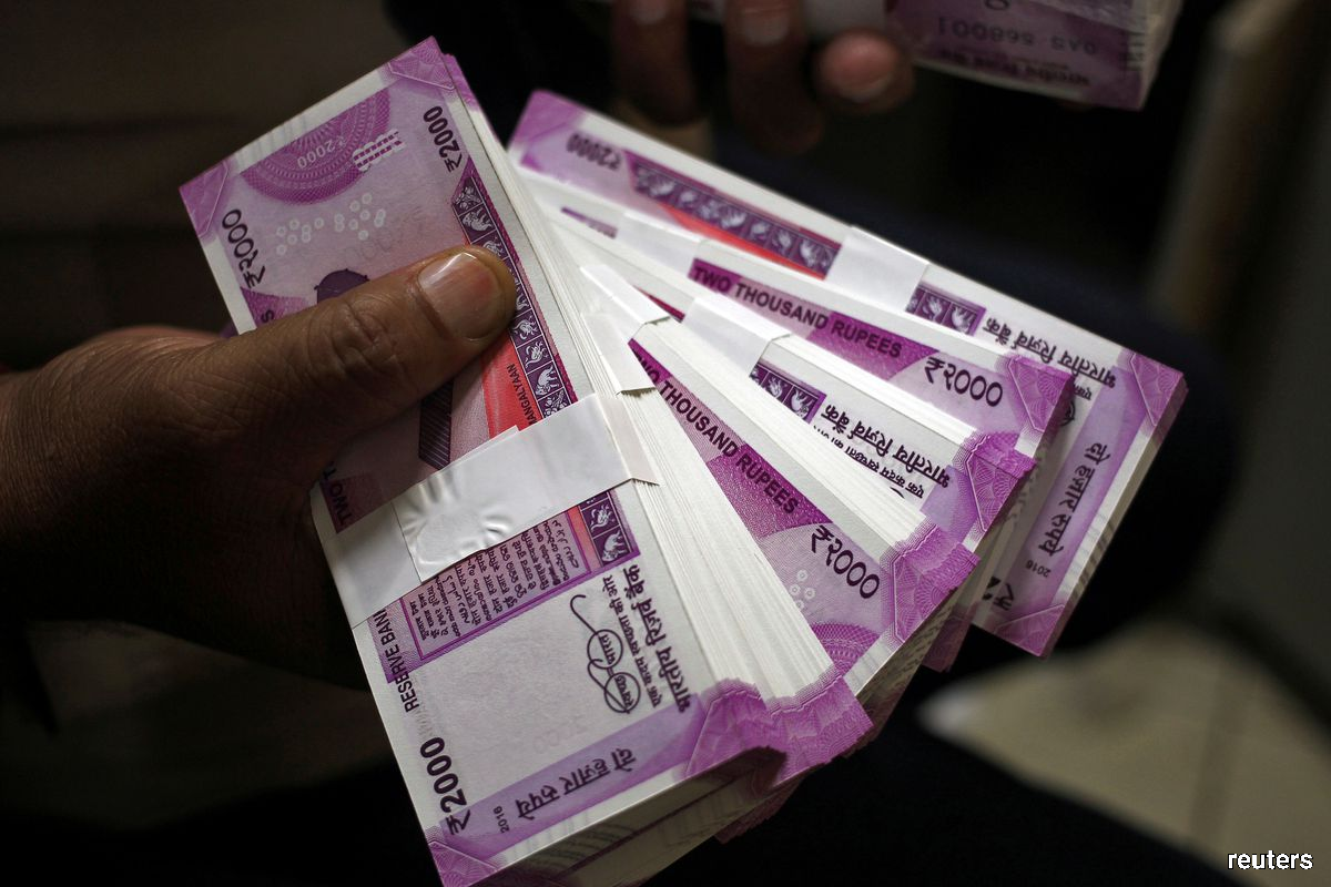 Indian rupee hits record lows, traders see more weakness
