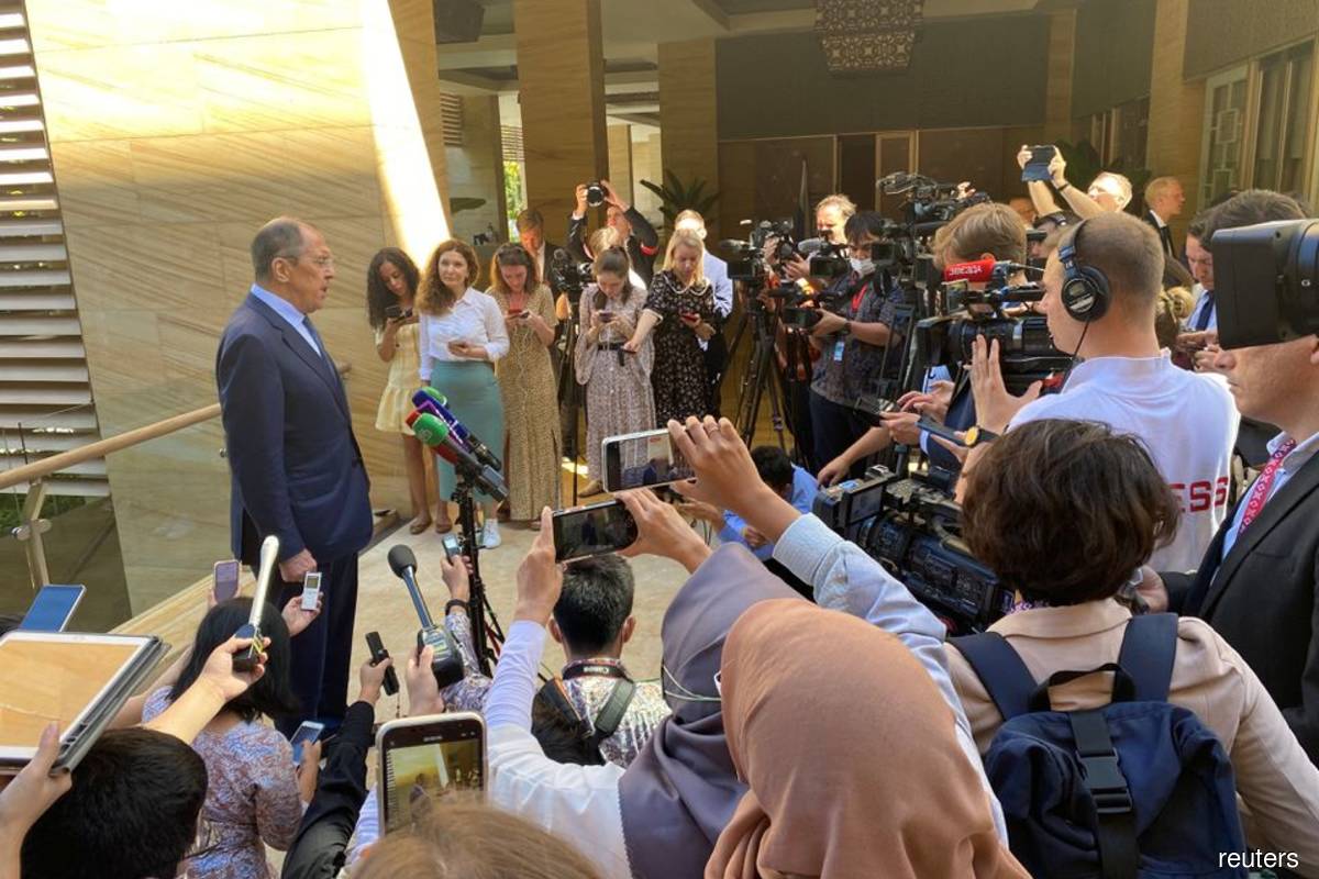 Russian Foreign Minister Sergei Lavrov is surrounded by press members during a doorstep at the G20 Foreign Ministers' Meeting in Nusa Dua, Bali, Indonesia, July 8, 2022.