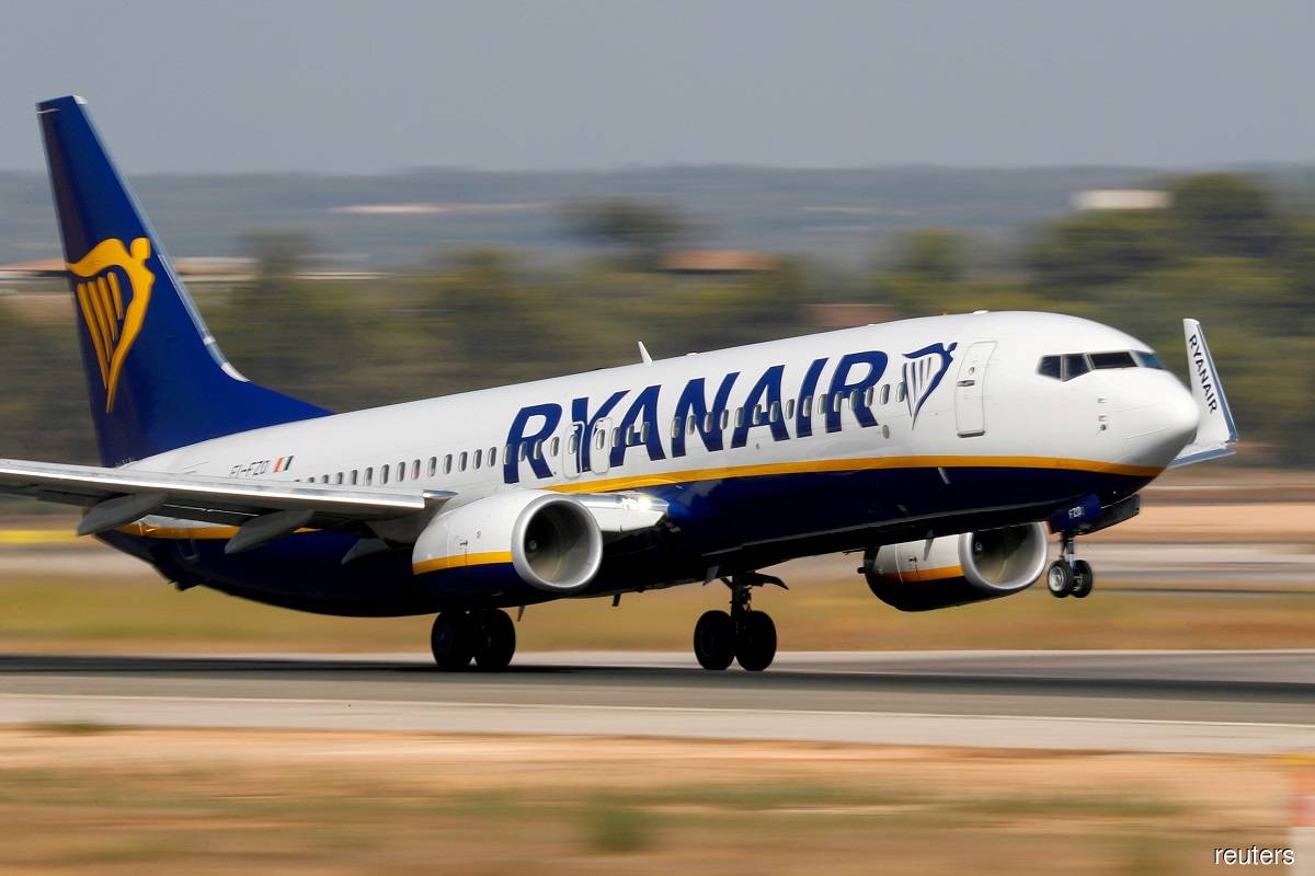 Ryanair nudges up annual traffic forecast as summer bookings surge