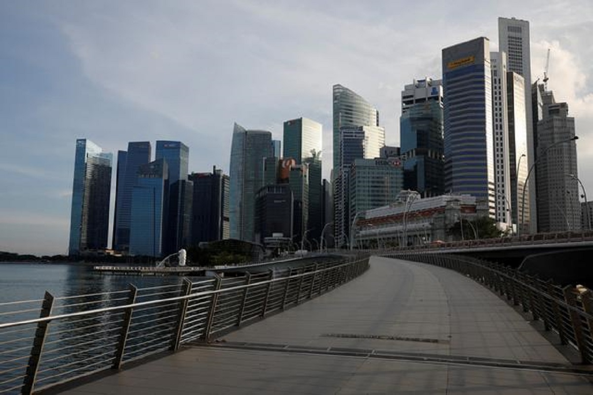Singapore to spend S$650m in virus aid as curbs tightened
