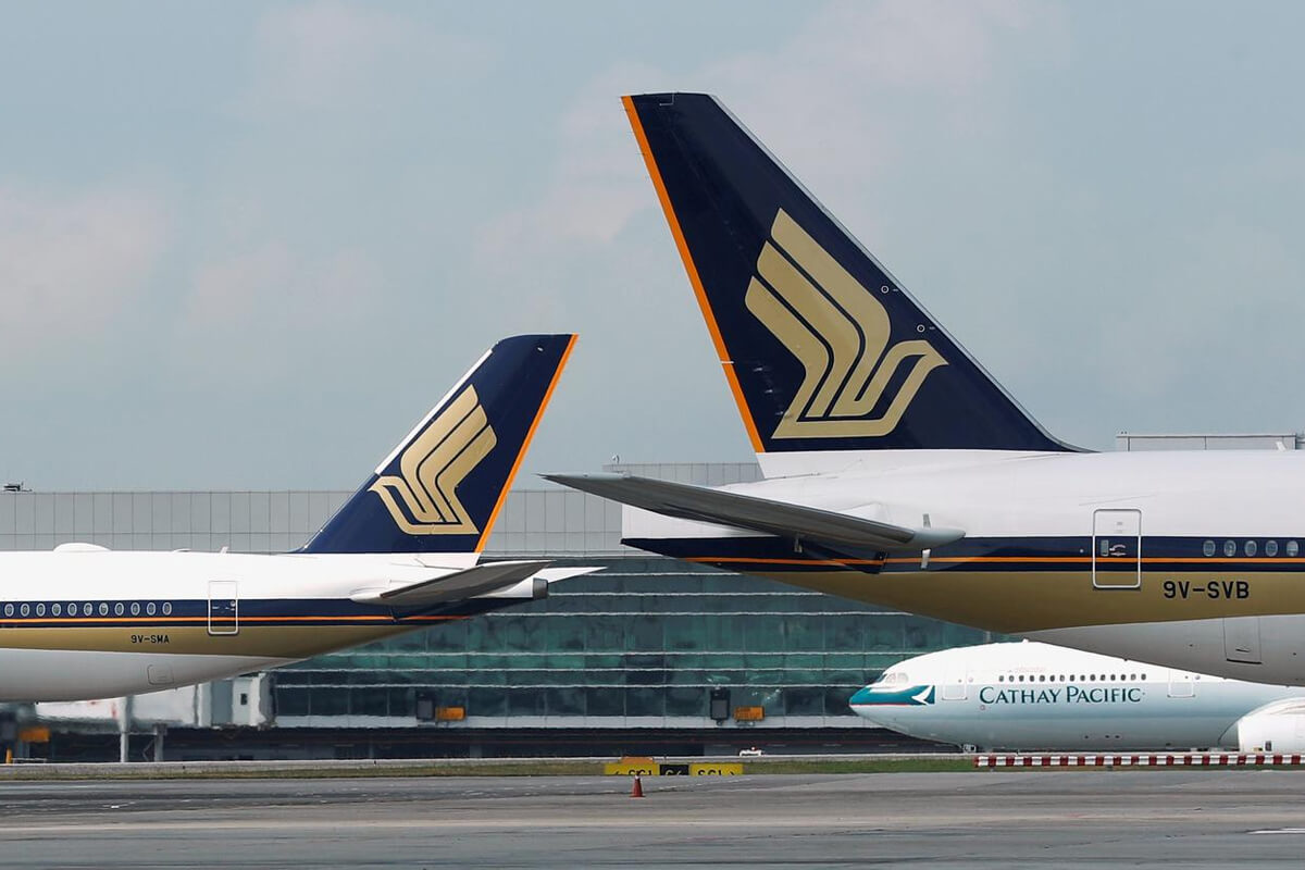 Singapore urges national airline to be first to vaccinate all staff
