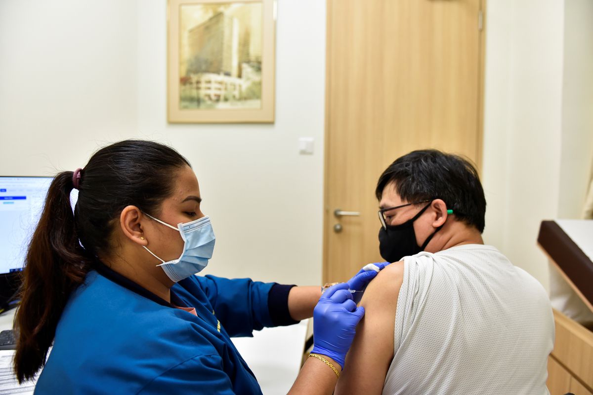 Singapore deploys its fake news law against anti-vaxxer group