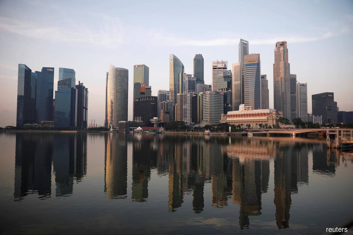 Singapore banks to benefit from economic recovery, says Fitch