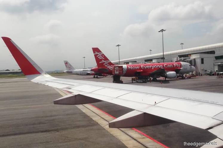 AirAsia down after rising on special dividend cue