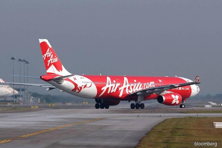 AirAsia X up after co says Tony Fernandes, Kamarudin Meranun to deal in securities