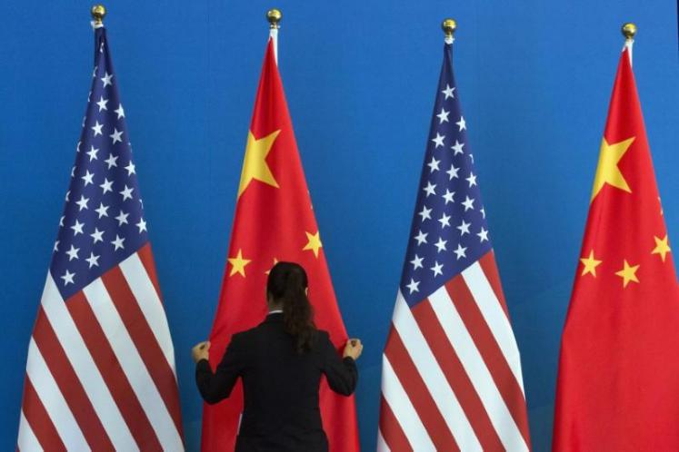 US pressing China to cut trade surplus by US$100 bil — White House