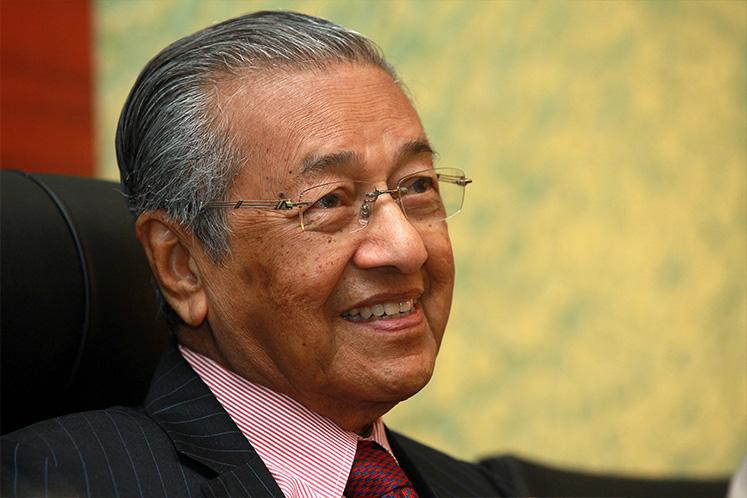 Slowing Malaysian economy poses challenge for Mahathir government