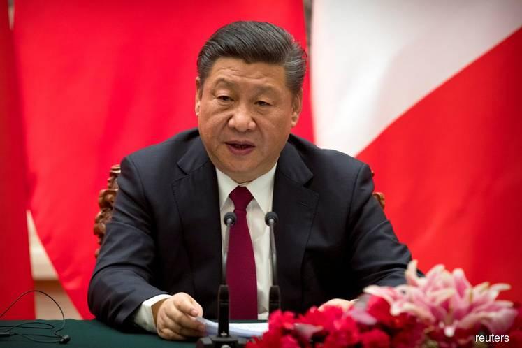 China to enshrine Xi's thought into state constitution amid national 'fervour'