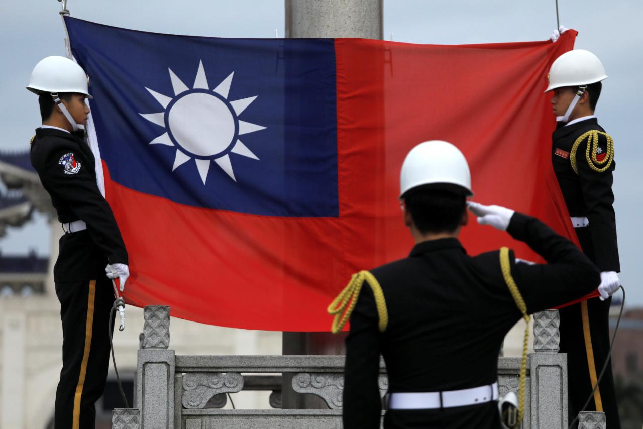 Taiwan denounces China's peaceful 'reunification' pledge