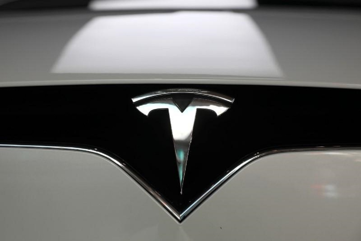 Tesla edges past Wall Street target as bitcoin sales, environmental credits boost revenue