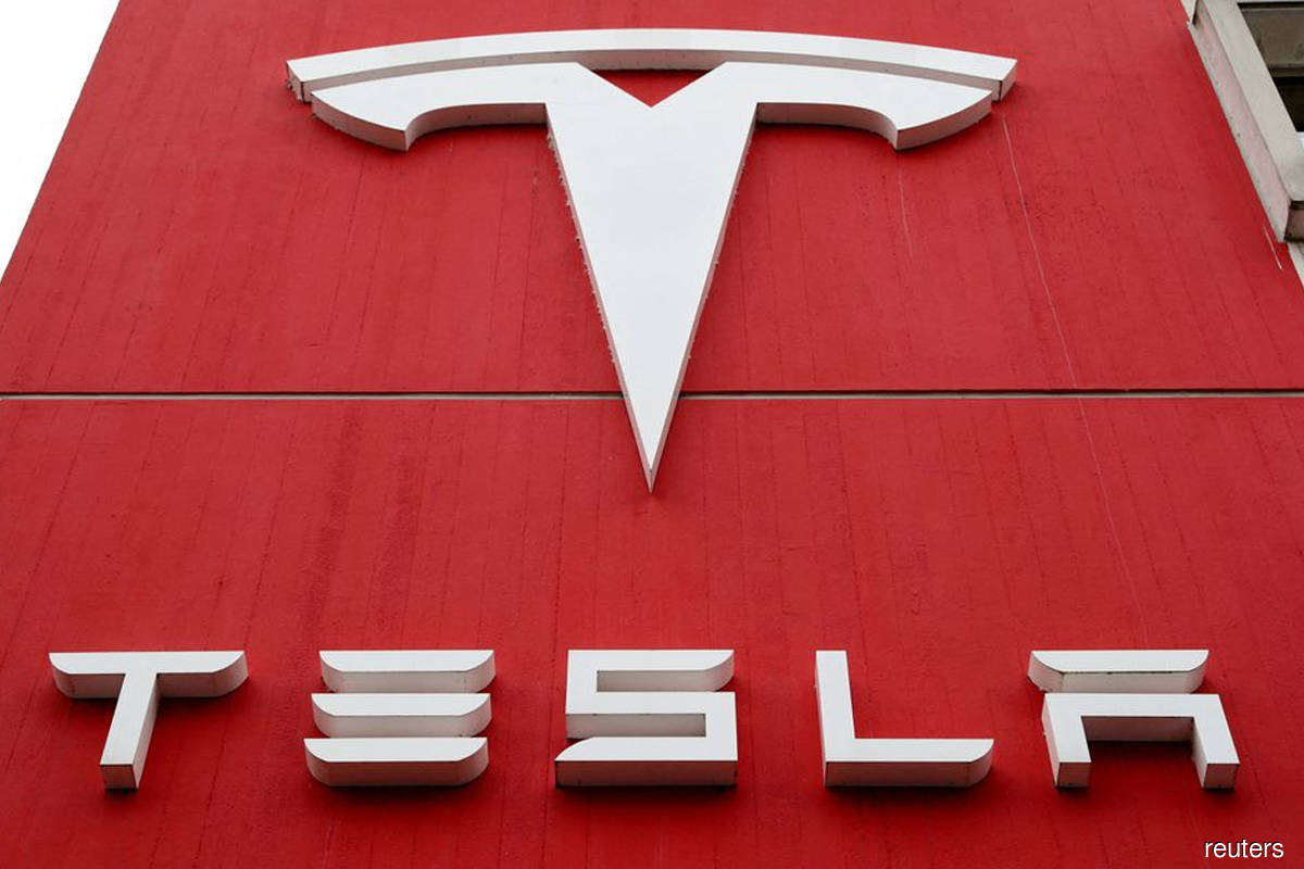 Tesla pulls games on moving car screens after US safety probe