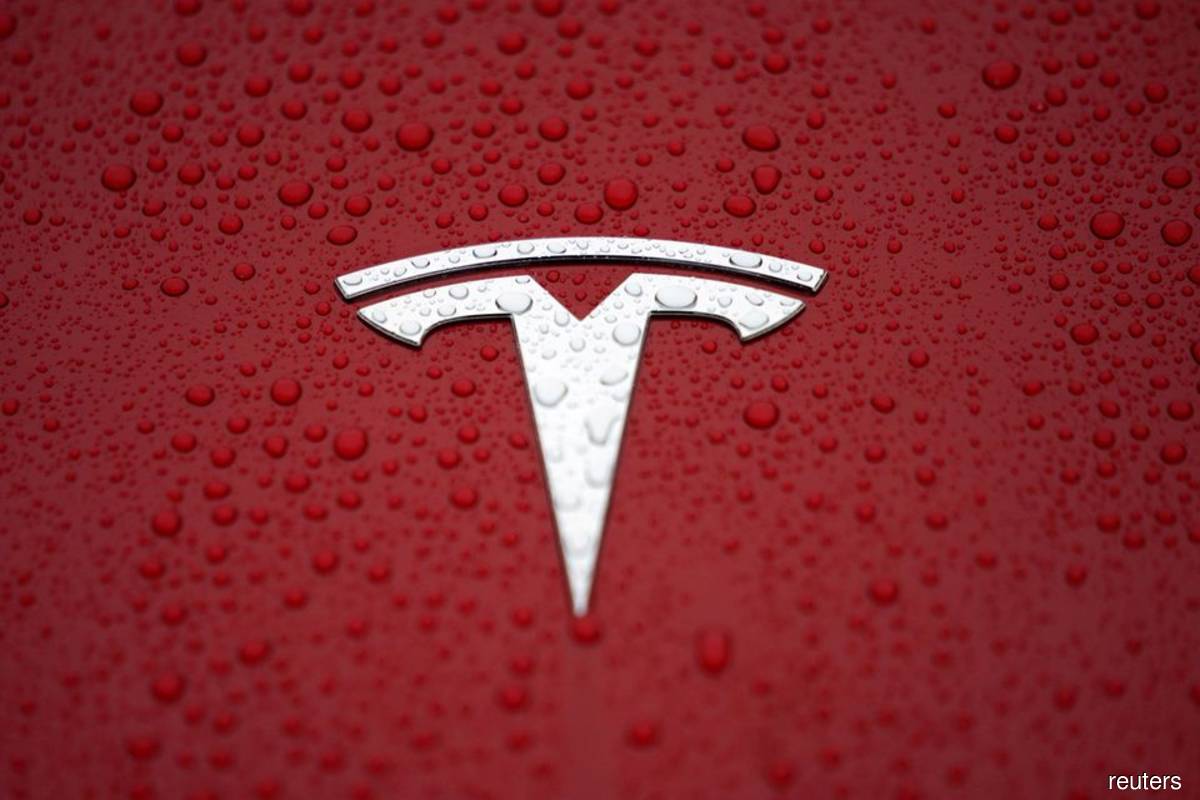 Tesla could face its toughest challenge yet as economy cools