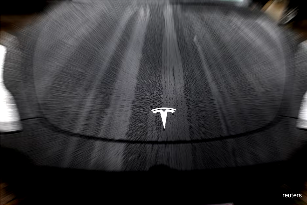 Tesla's German car sales drop by almost half in December