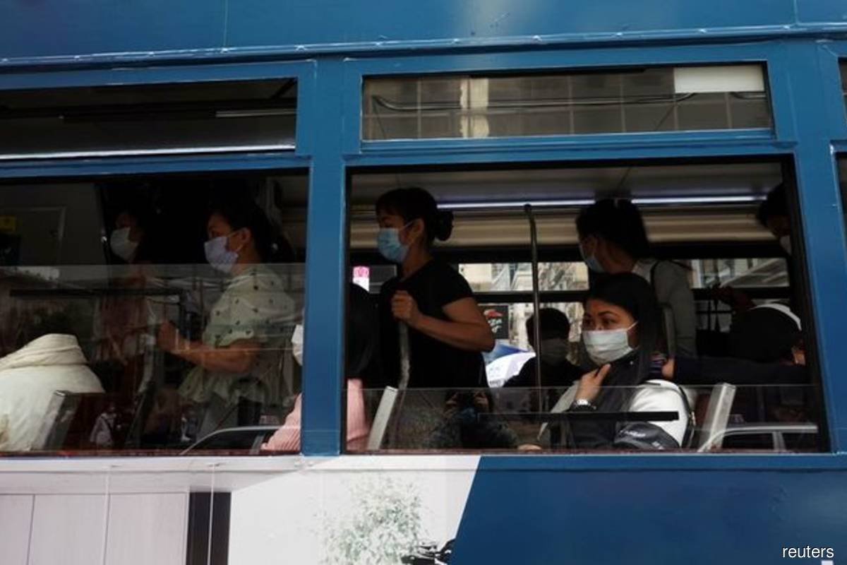 Hong Kong to close schools amid virus surge
