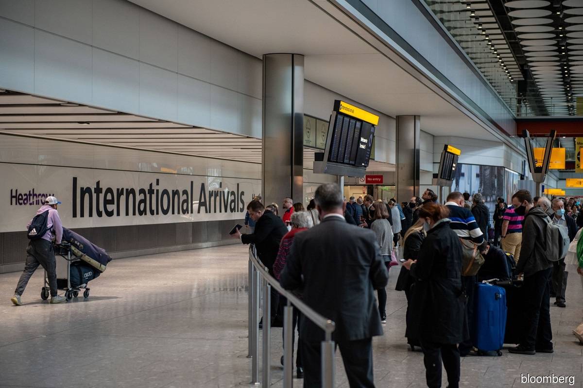 Heathrow Airport drops curbs, says 25,000 staff needed