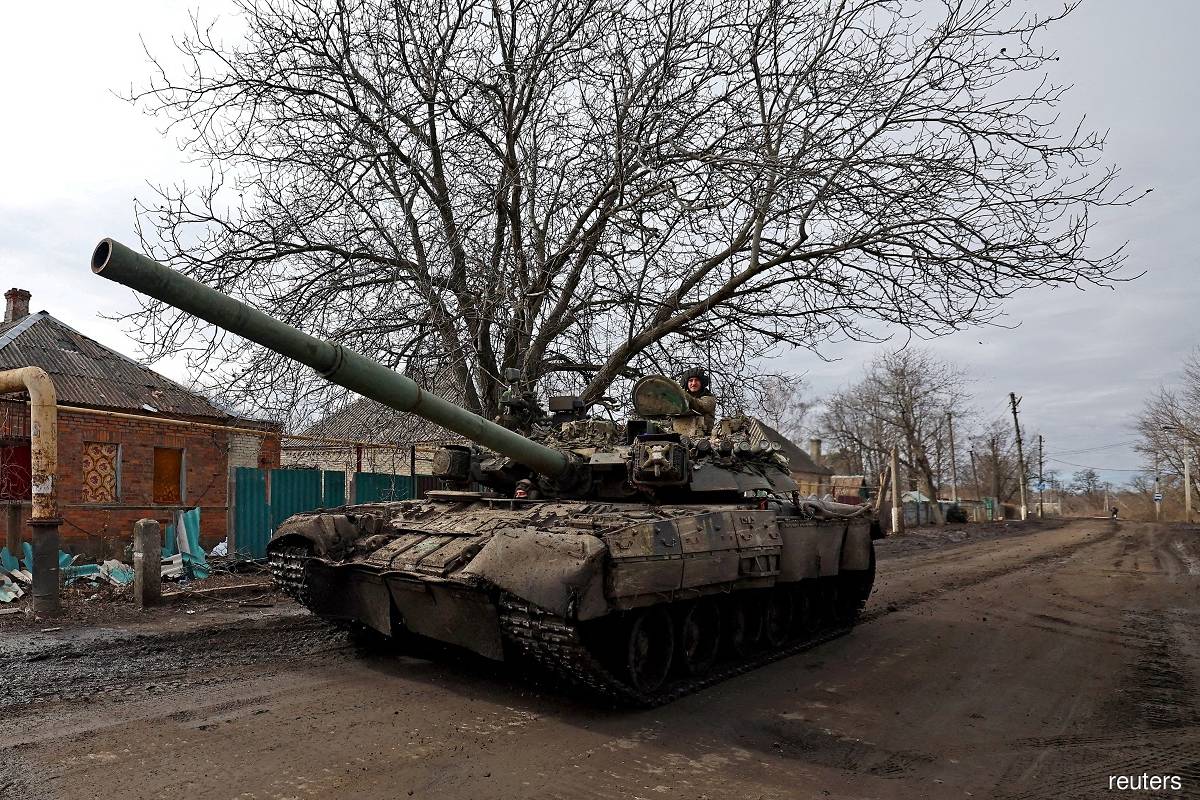 Ukraine clings to Bakhmut; Russia says it battles saboteurs in cross-border raid