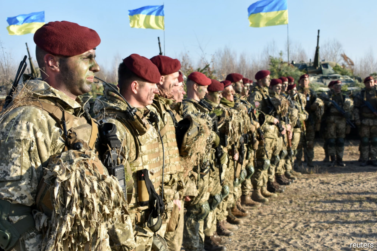 Futures slide as Ukraine tensions dent mood at start of crucial week