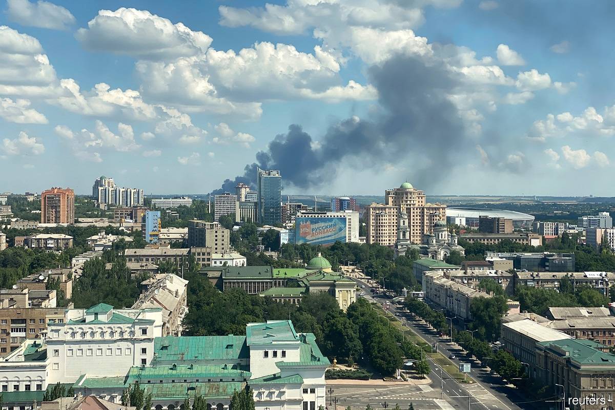 Smoke seen billowing from an area in Donetsk, Ukraine after being shelled on July 4, 2022.
