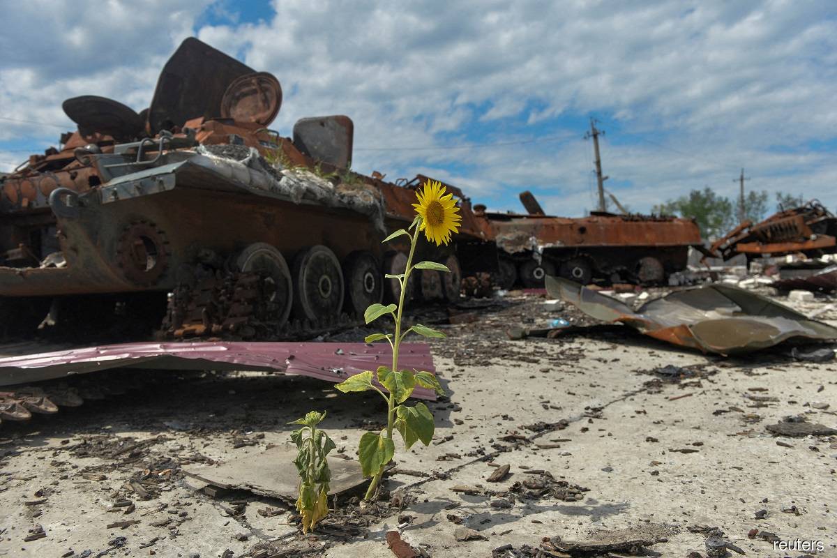 Destroyed Russian military vehicles seen at a compound of an agricultural farm, which was used by Russian troops as a military base, in Kharkiv Region, Ukraine on July 17, 2022.