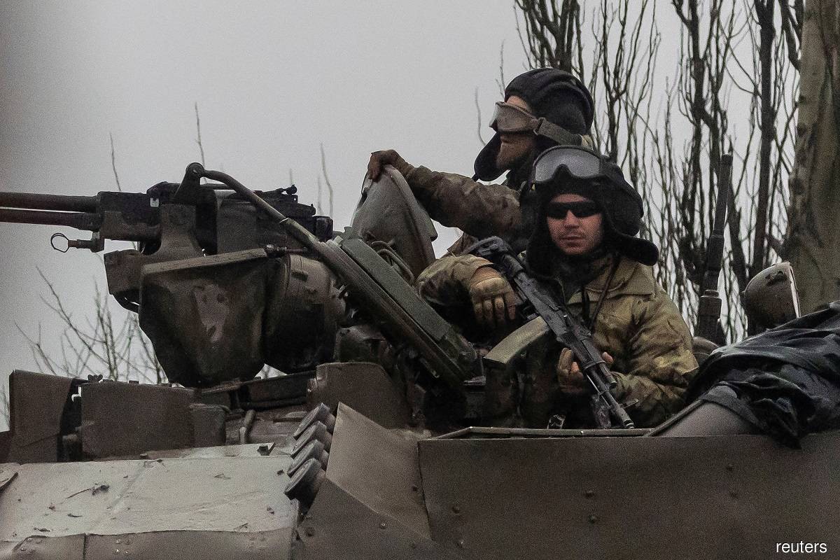 A Ukrainian tank seen on the move in Mariupol, Ukraine after Russian President Vladimir Putin authorised a military operation in eastern Ukraine on Feb 24, 2022.