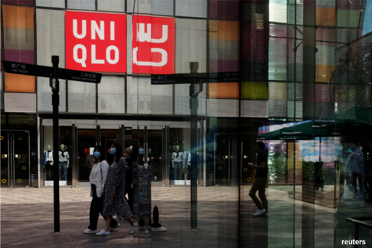 Uniqlo owner set for record annual profit, but all eyes on China showing