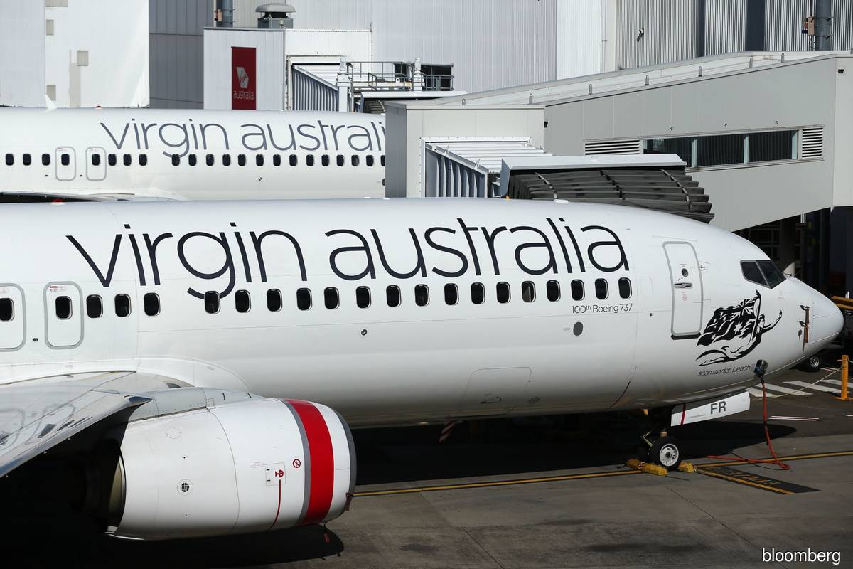 Virgin Australia sees challenging profit outlook on key routes with Rex entry