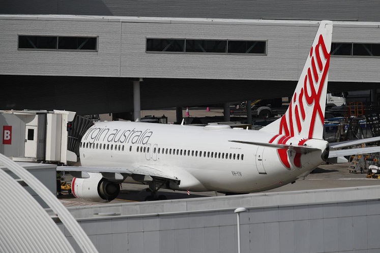Indian billionaire behind budget carrier IndiGo joins bidding race for Virgin Australia