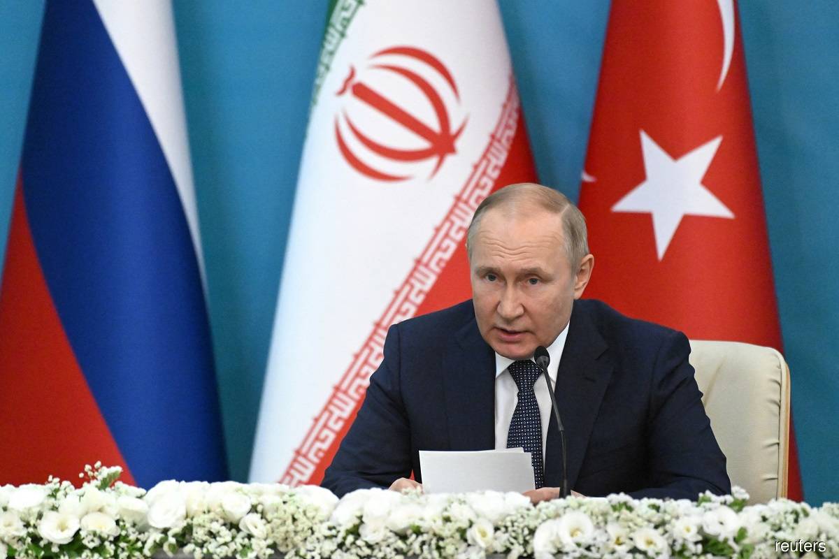 Russian President Vladimir Putin speaking at a news conference following the Astana Process summit in Tehran, Iran on July 19, 2022.