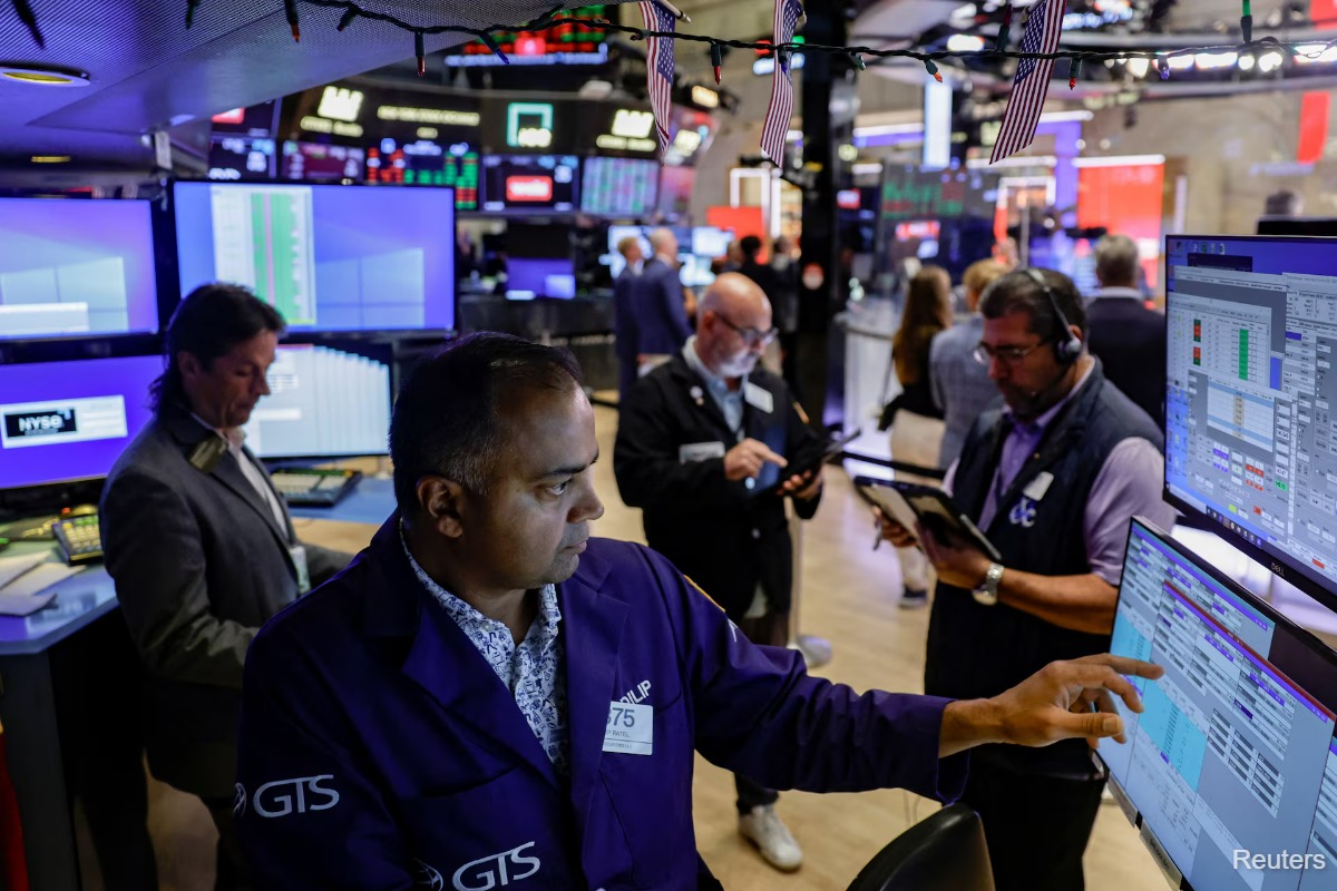 Photo: theedgemalaysia.com Wall Street gains as AI earnings lift tech, inflation data supports rate-hold bets