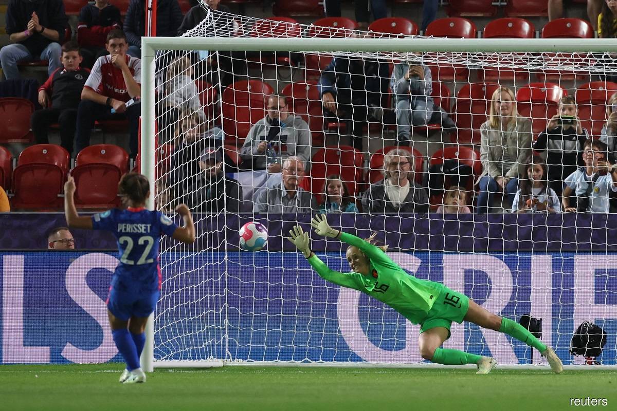 Eve Perisset (left) scoring France's only and the winning goal from the penalty spot in the women's Euro 2022 quarter-final match against the Netherlands at the AESSEAL New York Stadium in Rotherham, Britain on July 23, 2022.