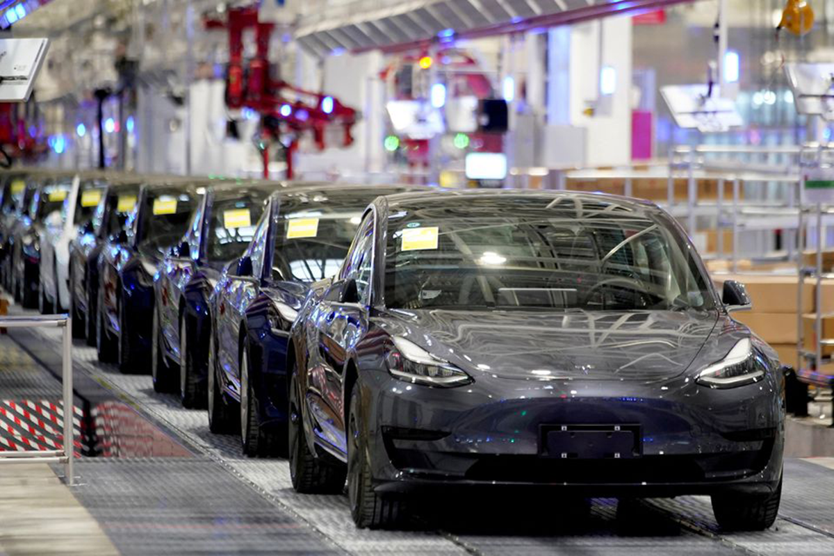 Tesla China-made Model 3 vehicles are seen during a delivery event at its factory in Shanghai, China January 7, 2020. (Photo by Reuters)