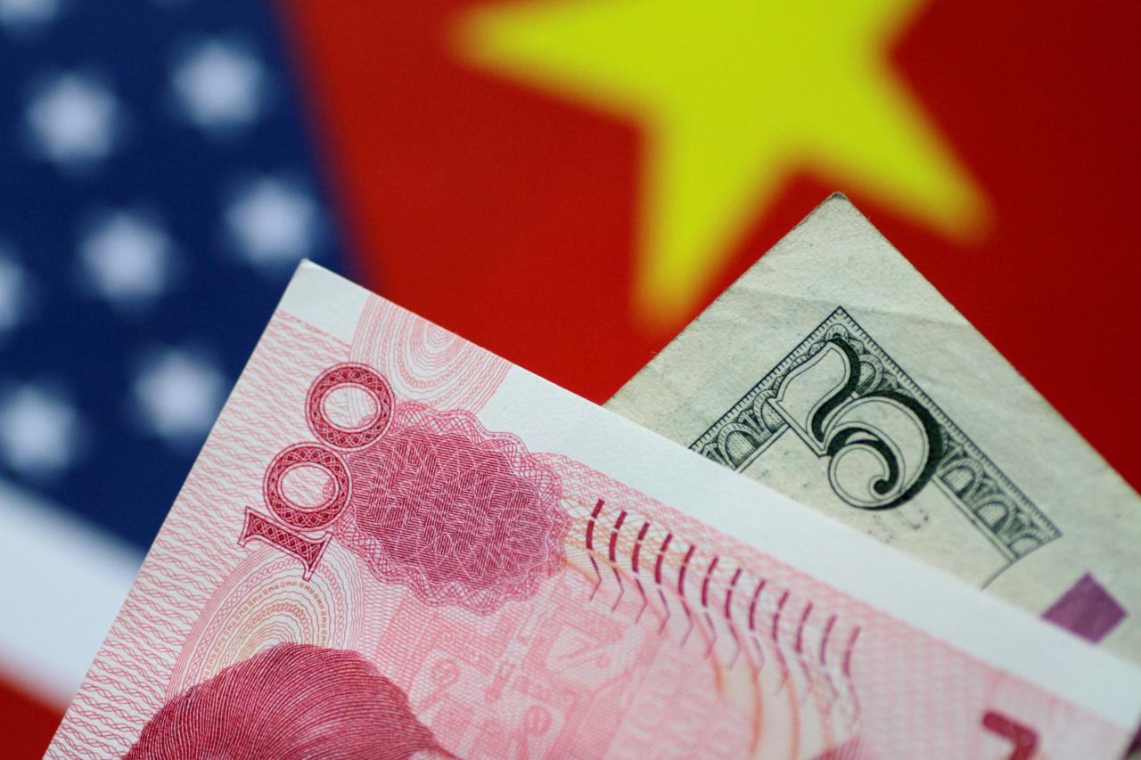 China’s foreign exchange reserves drop to near four-year low