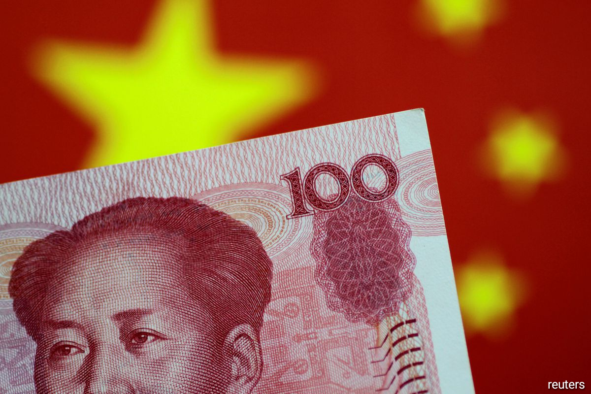 China's yuan hits 15-year low after official guidance breaches key level
